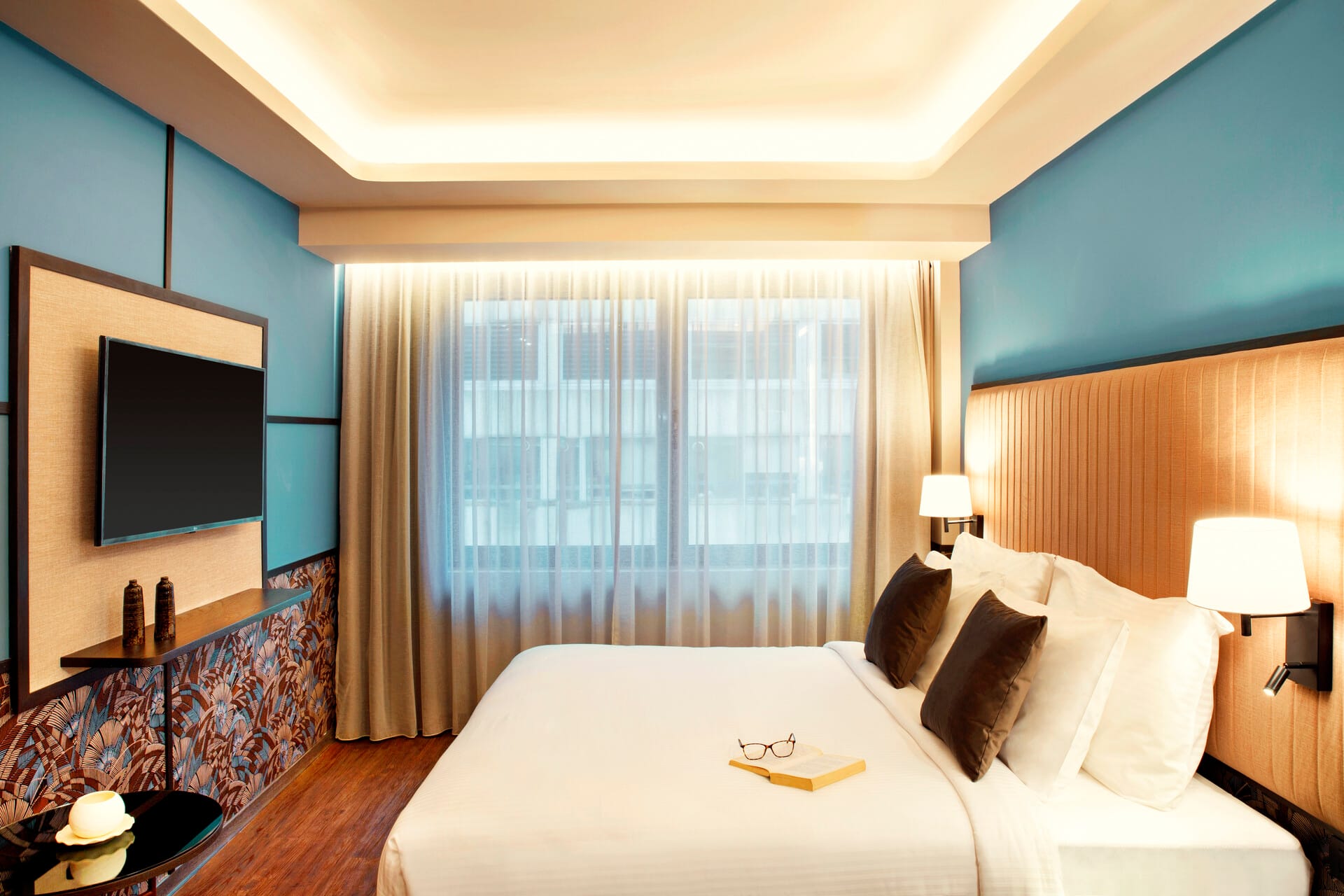 a hotel room with a large window