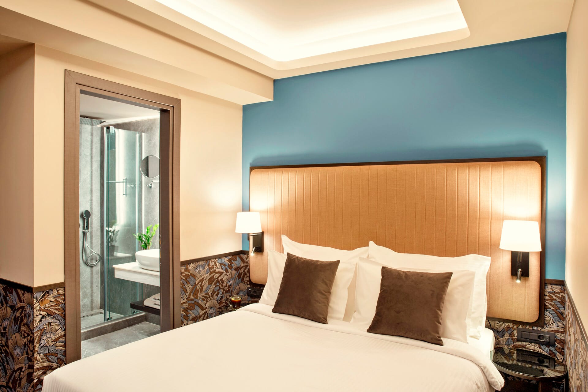 a bed with a white bed spread