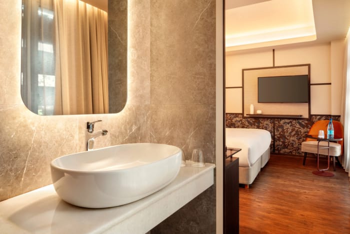 a bathroom with a large mirror