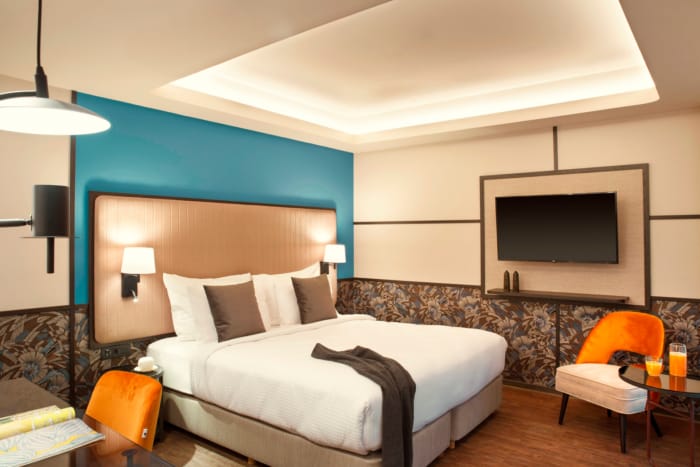 a bedroom with a large bed