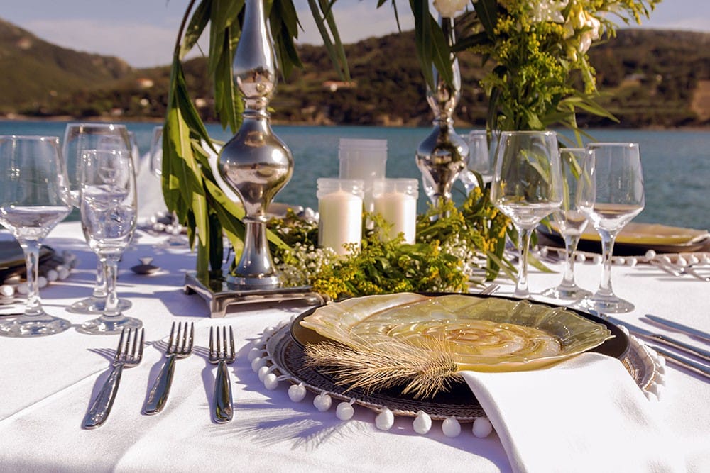 a table with plates and glasses