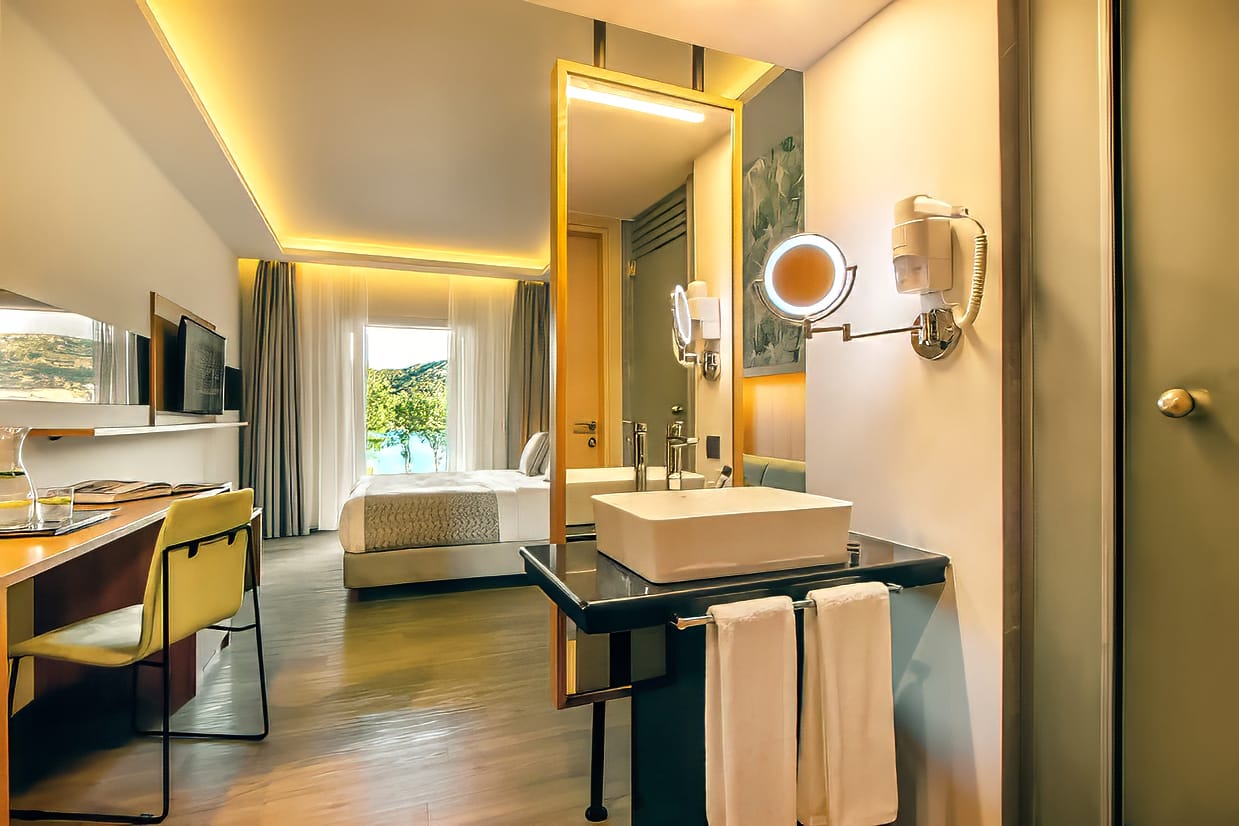 a bathroom with a mirror and sink