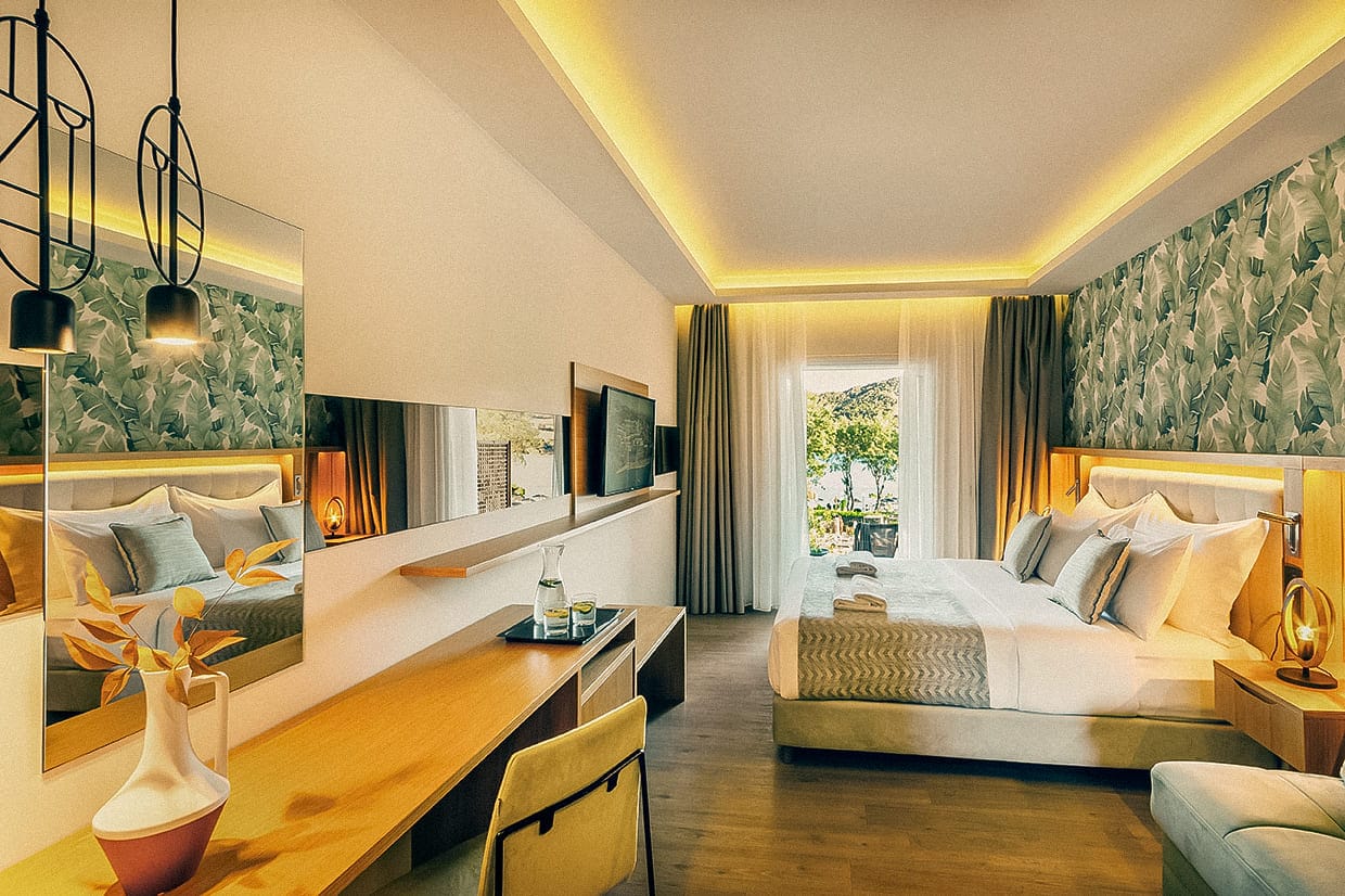 a room with a bed and a desk
