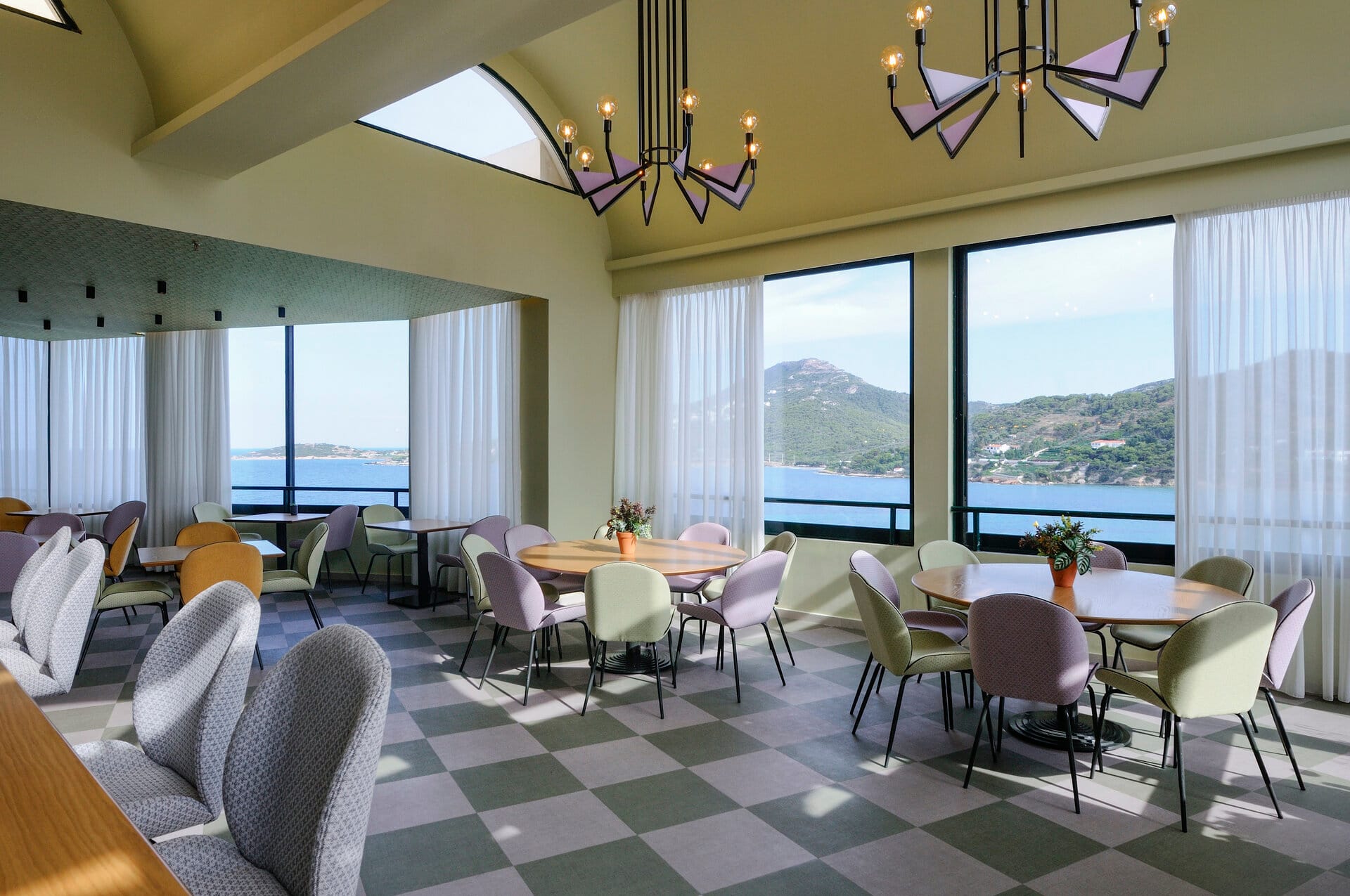 a room with tables and chairs