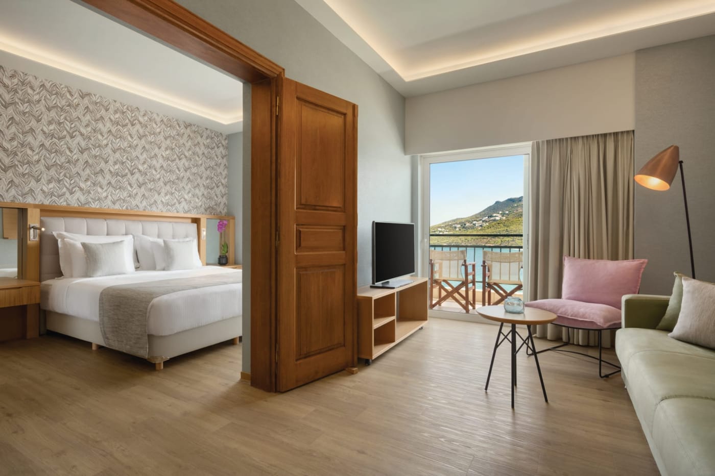 a bedroom with a large window