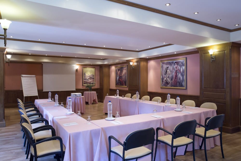 a room with tables and chairs