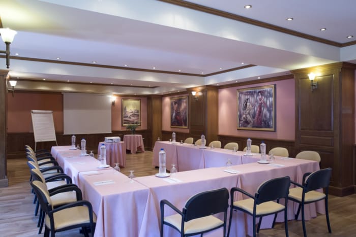 a room with tables and chairs