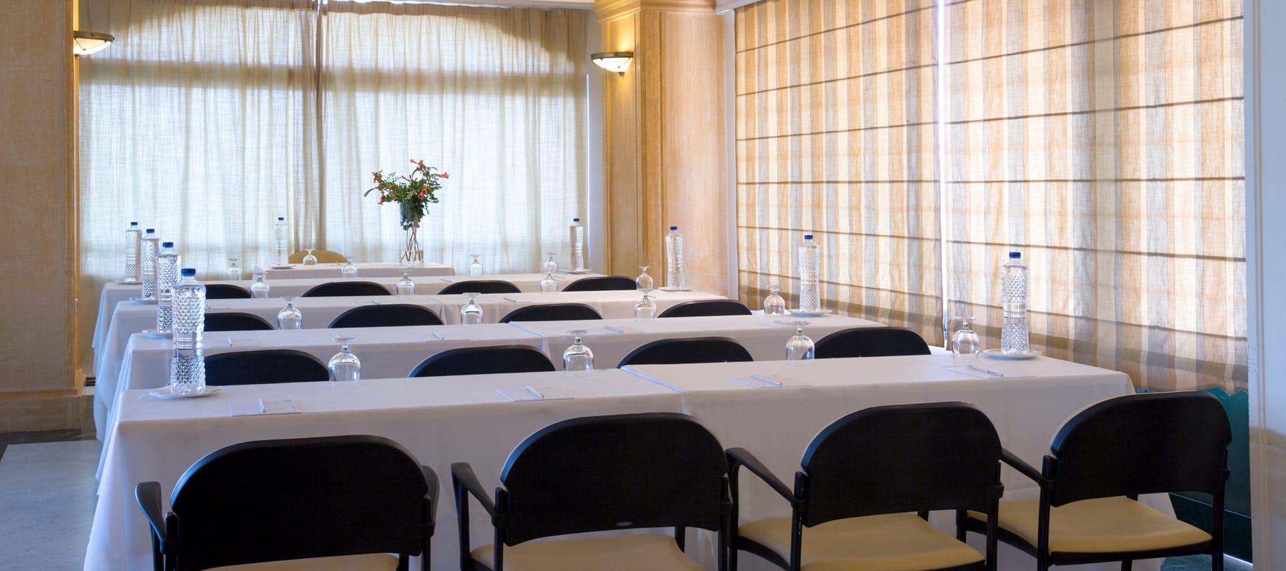 a room with a table and chairs