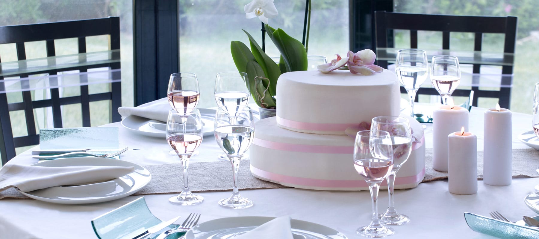a table with plates and glasses