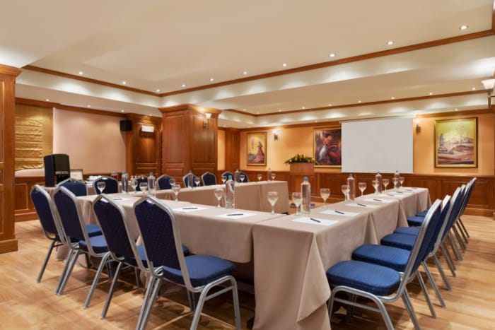 a room with tables and chairs