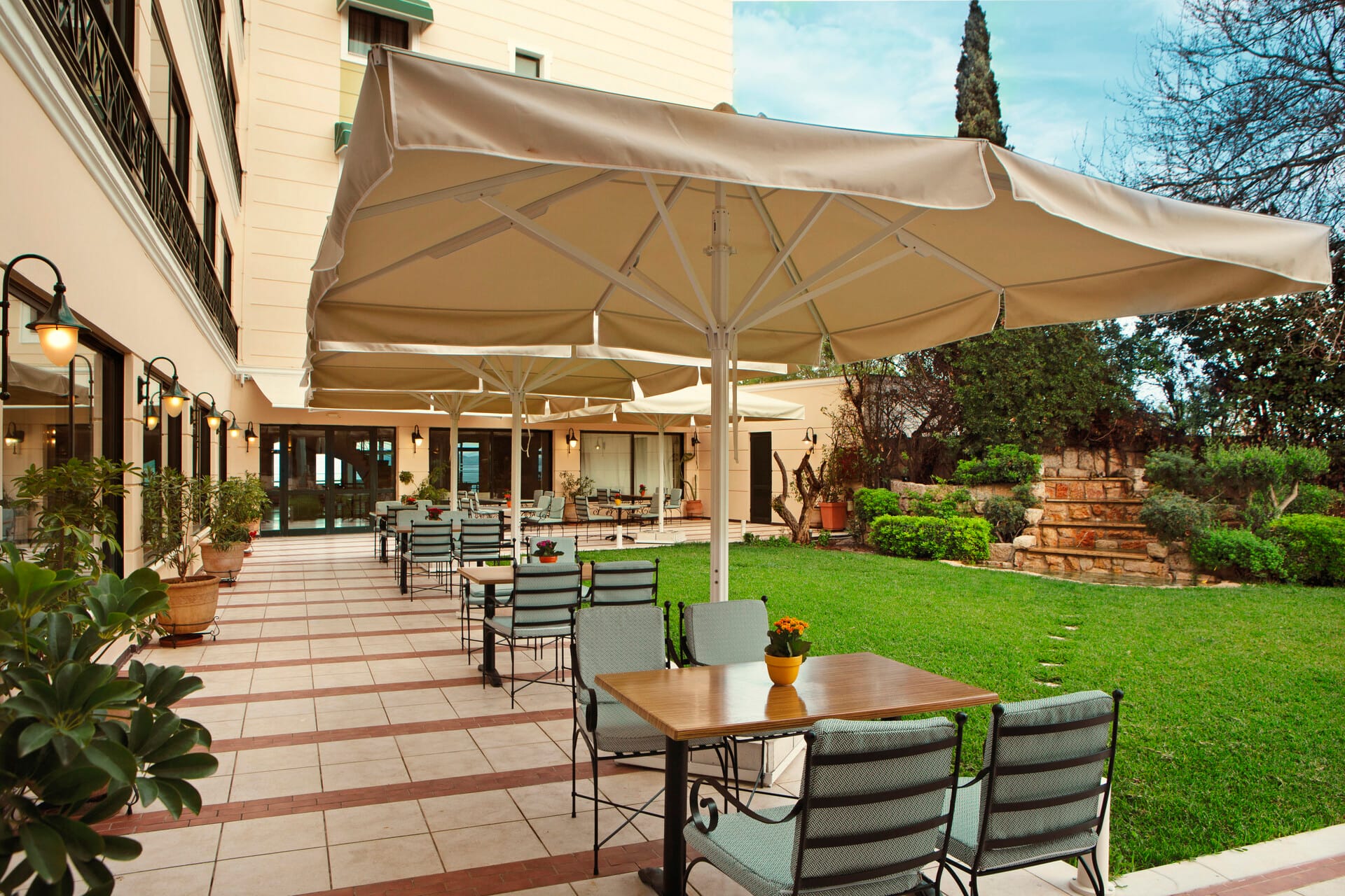 a patio with a table and chairs
