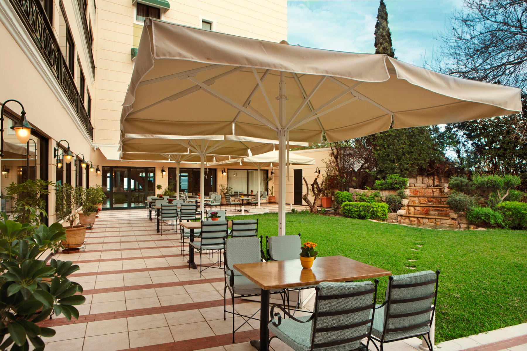 a patio with a table and chairs