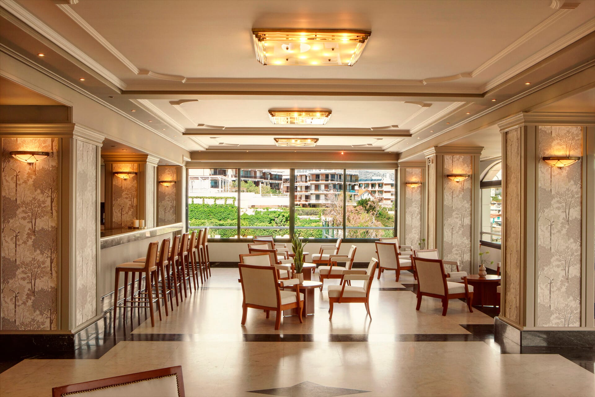 a room with a large window and chairs