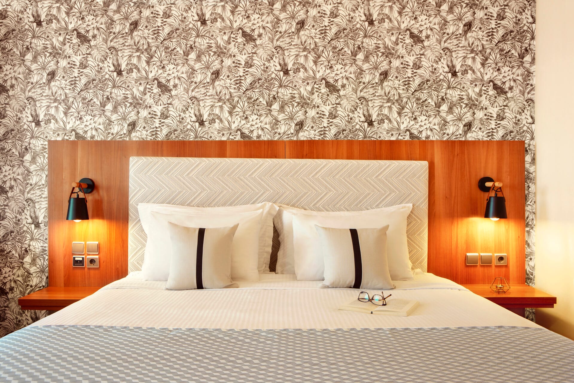 a bed with a white bed spread