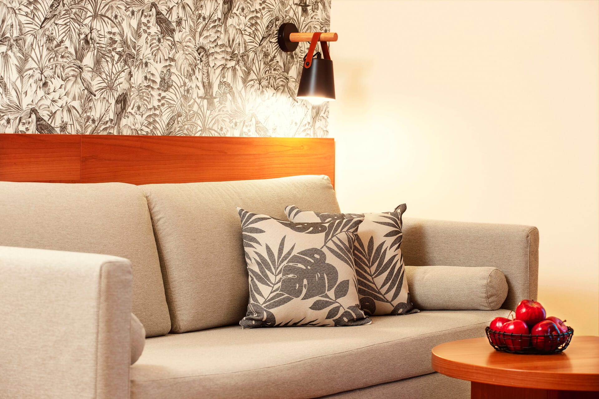 a couch with a pillow and pillows