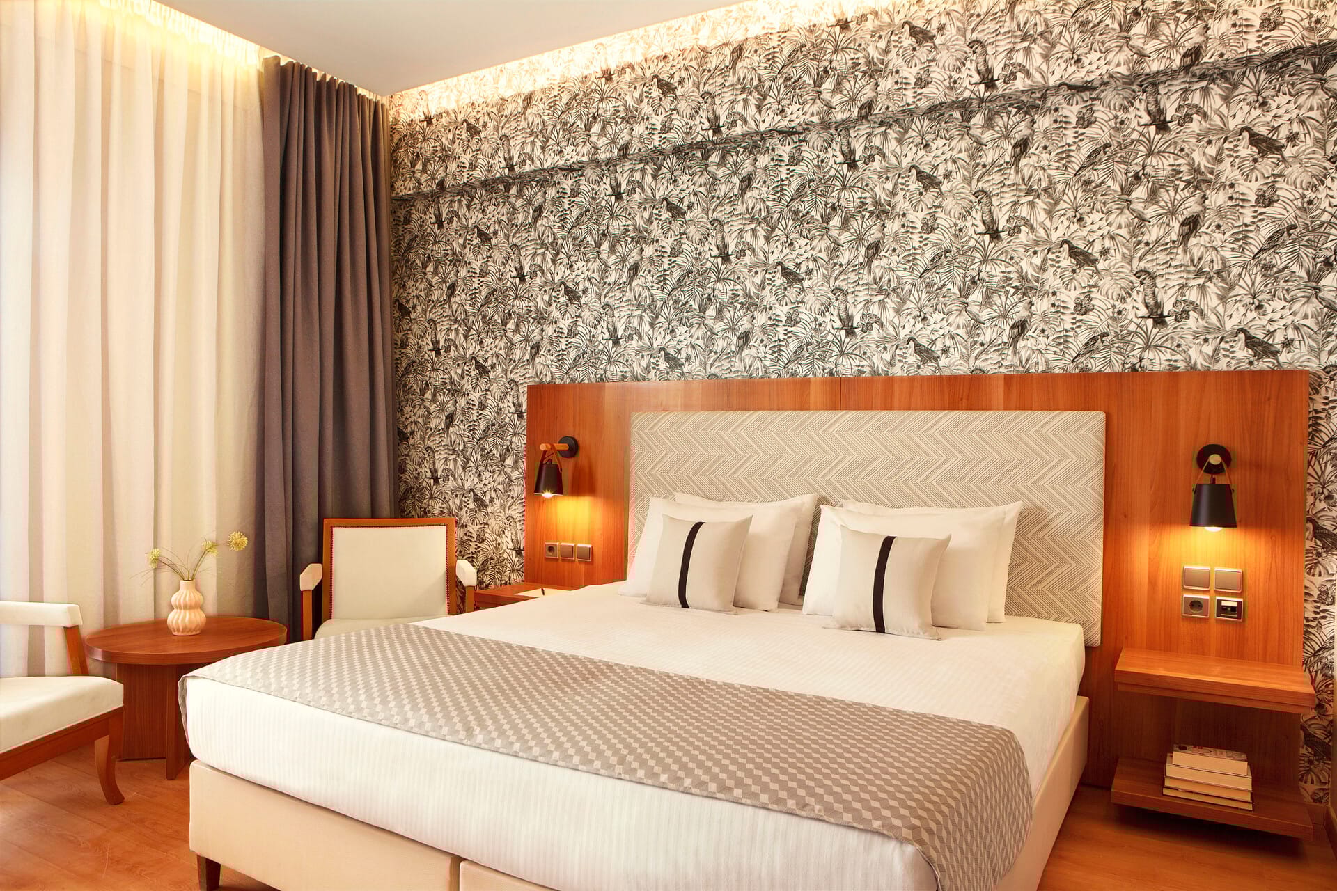 a bed with a wallpaper