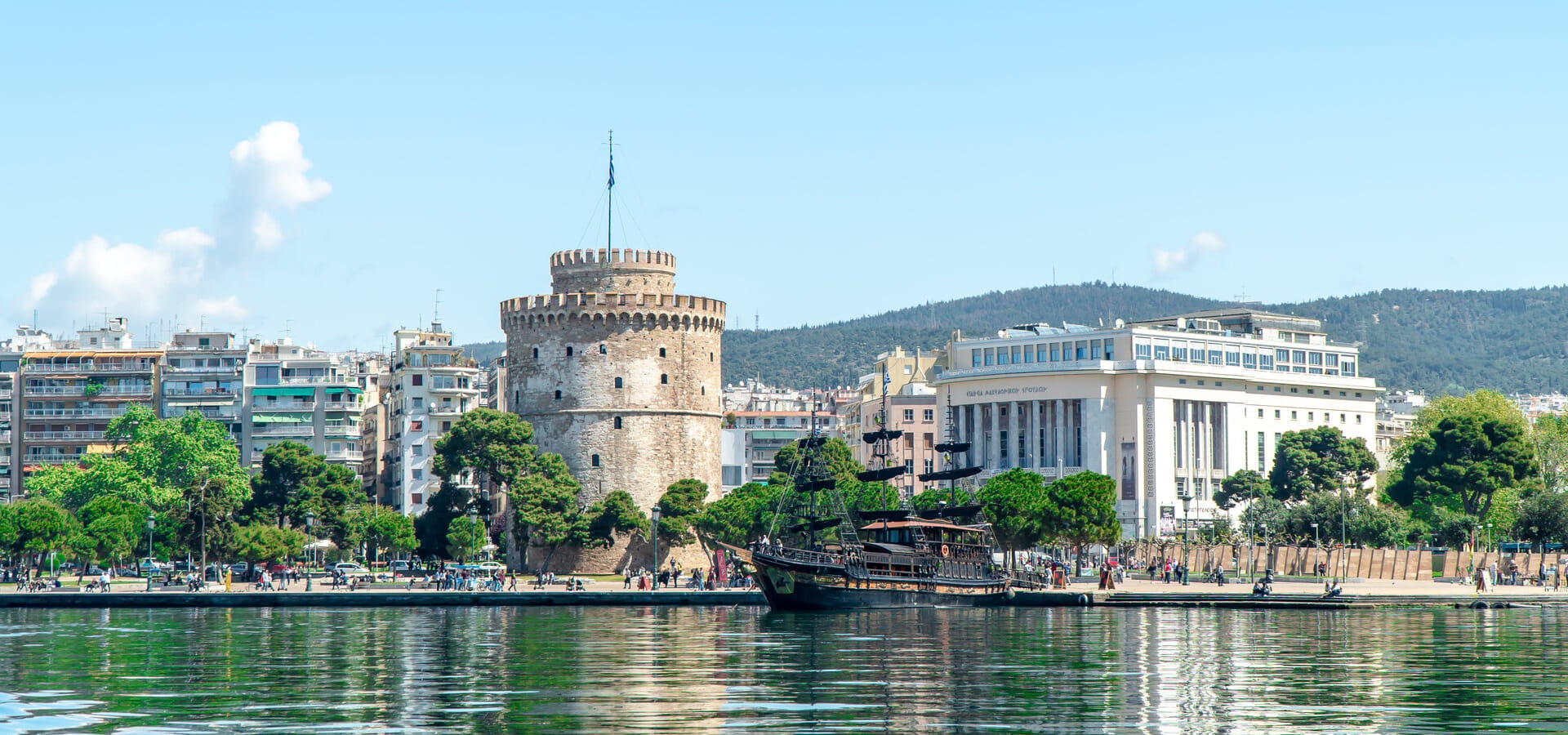 a body of water with buildings along it