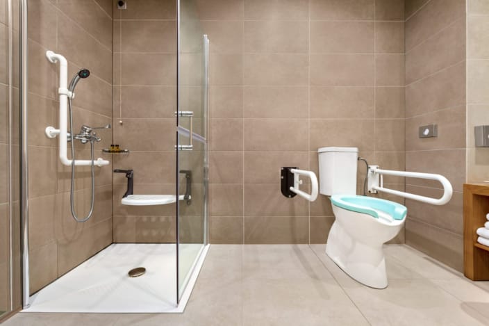 a bathroom with a glass shower