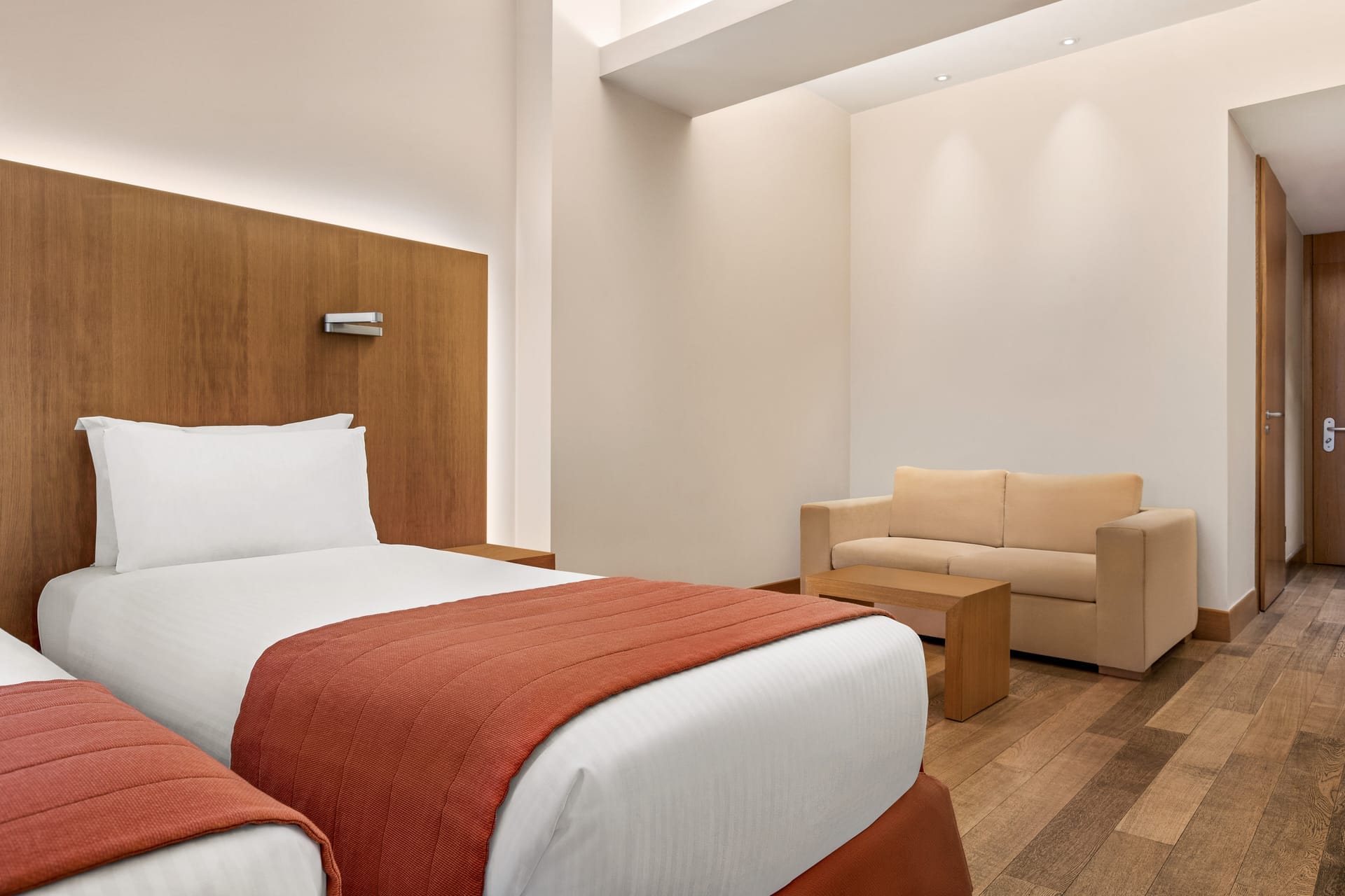 a room with a bed and couch