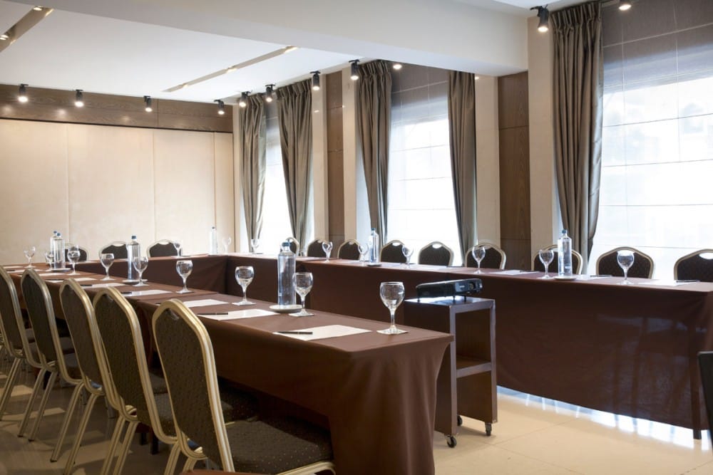 a room with a table and chairs