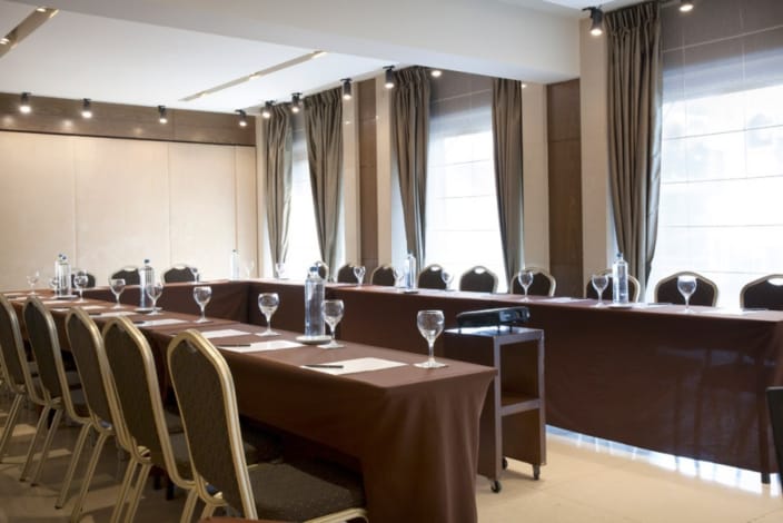 a room with a table and chairs