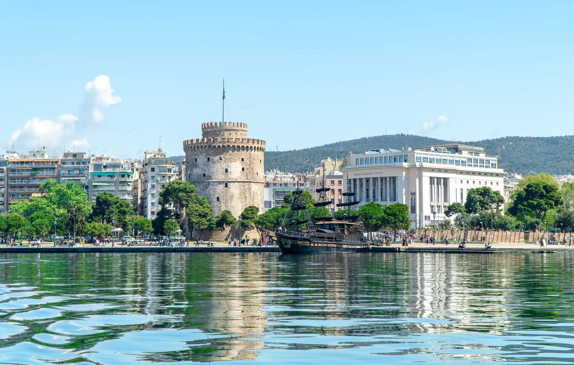 a body of water with buildings along it
