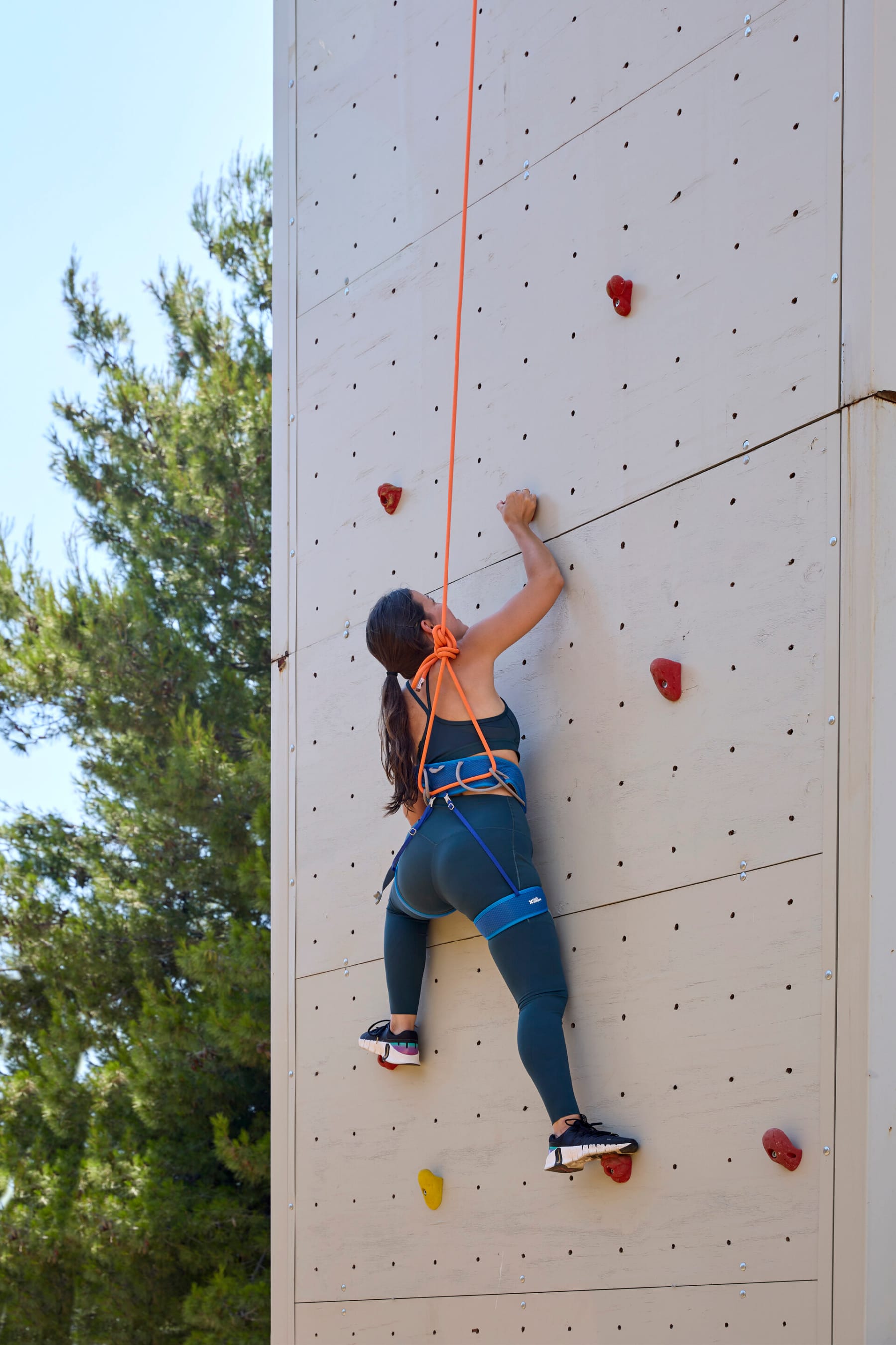 a man climbing a wall