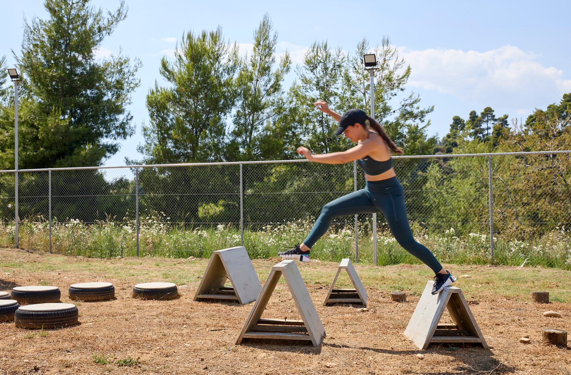 a person doing a plank on a wooden platform