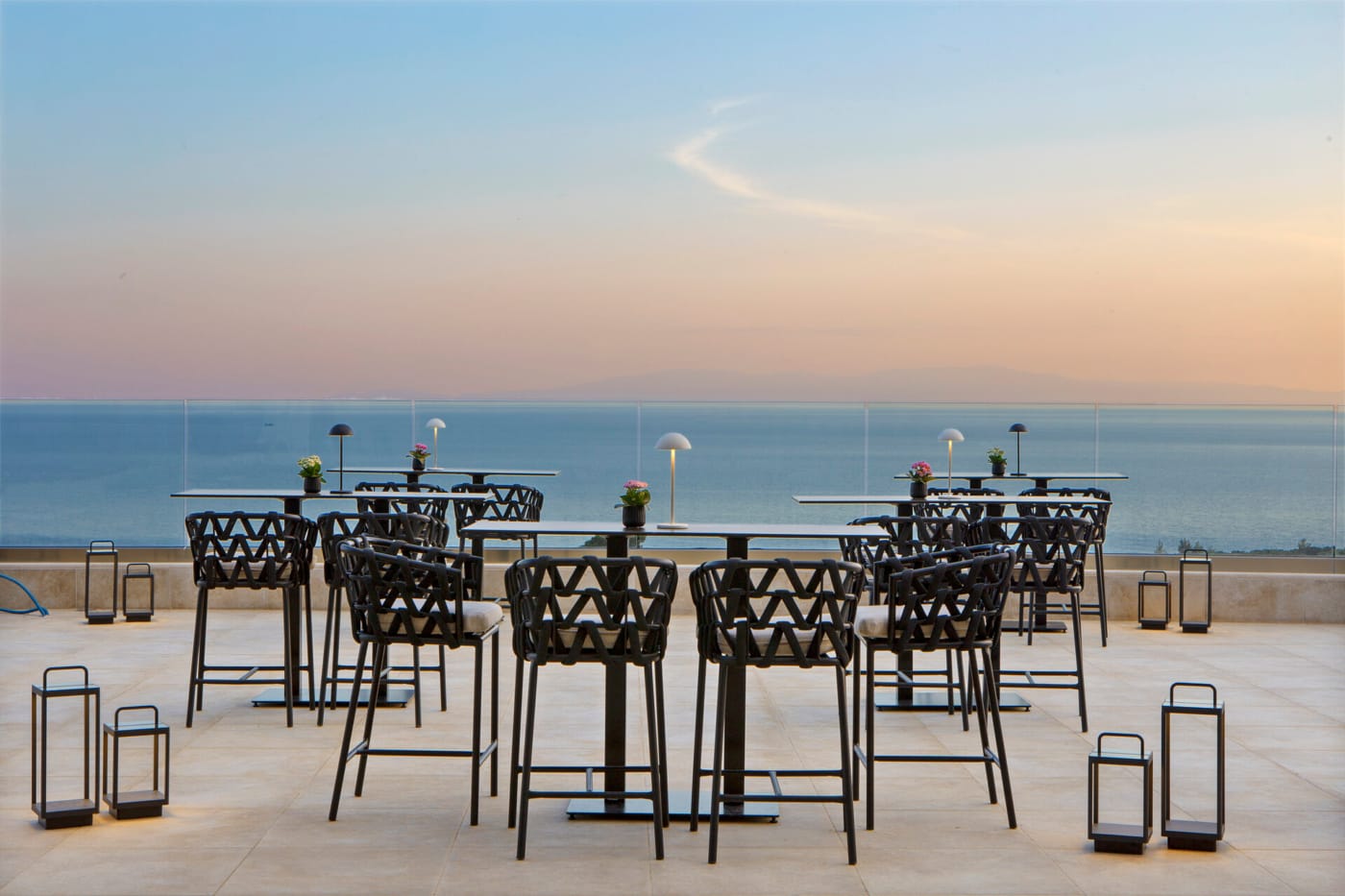 a group of chairs on a dock