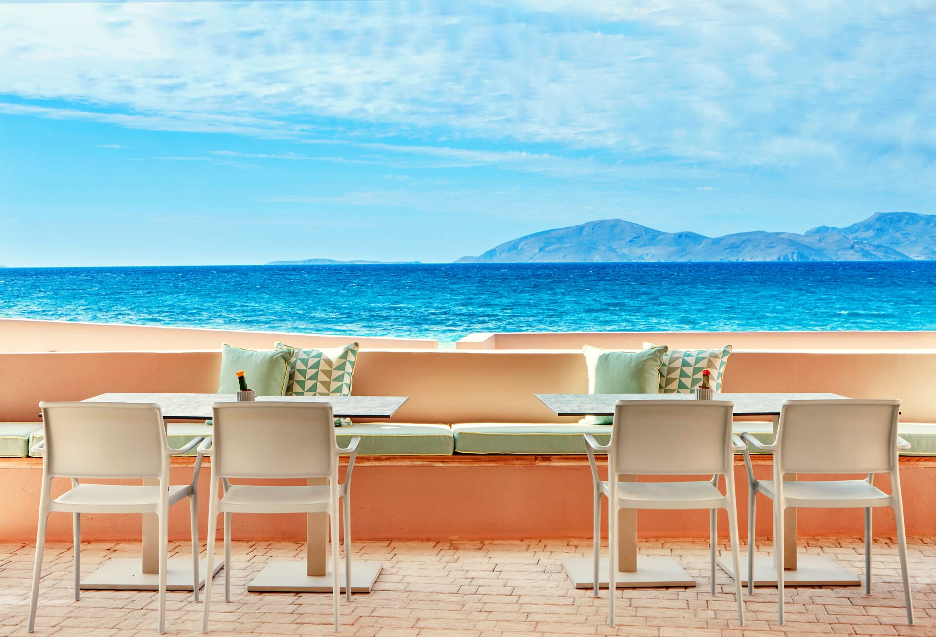 a table and chairs on a deck