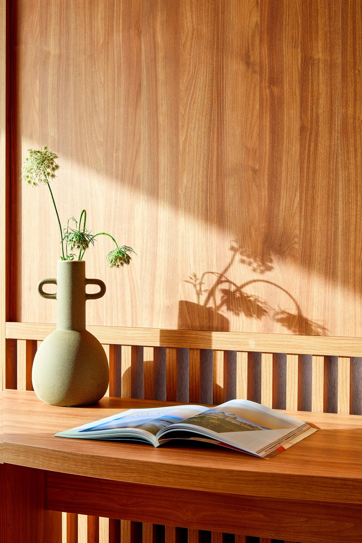 a vase with a plant in it