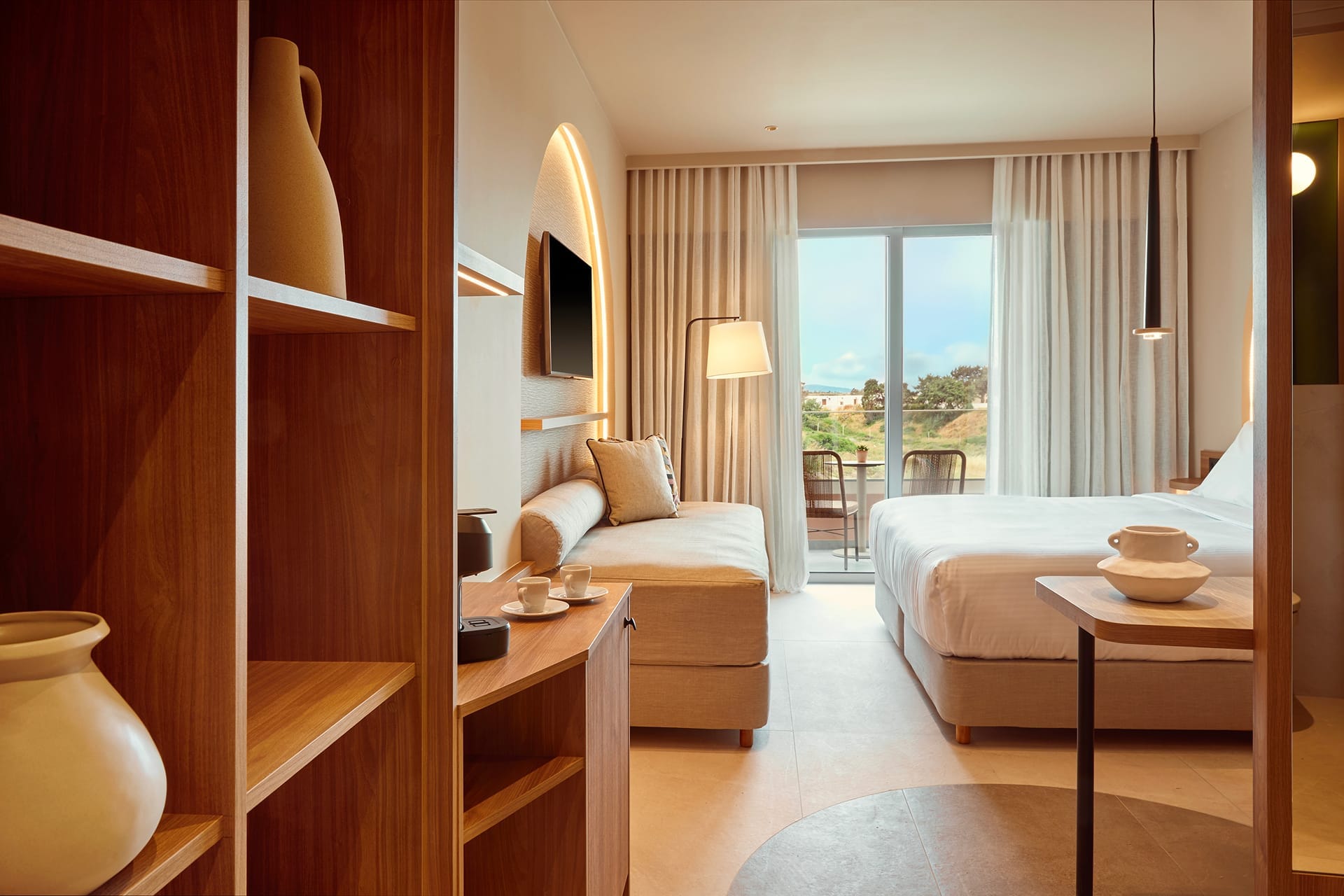 a room with a bed and a desk