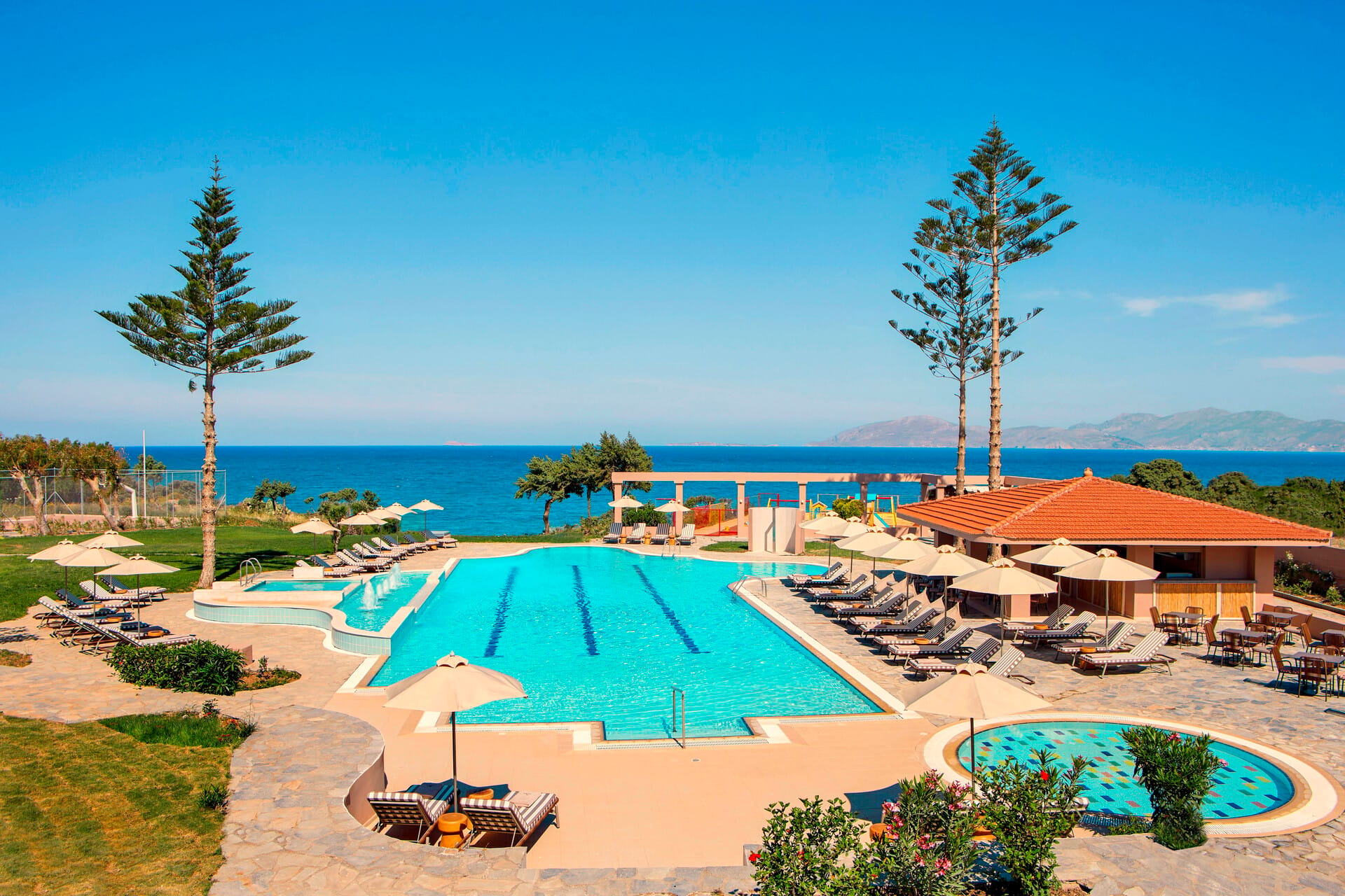 a pool next to a beach