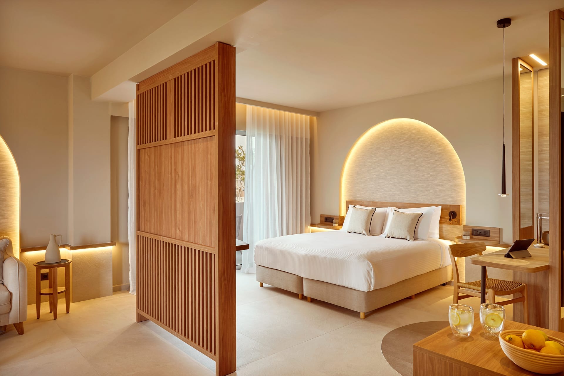 a large room with a bed and a couch