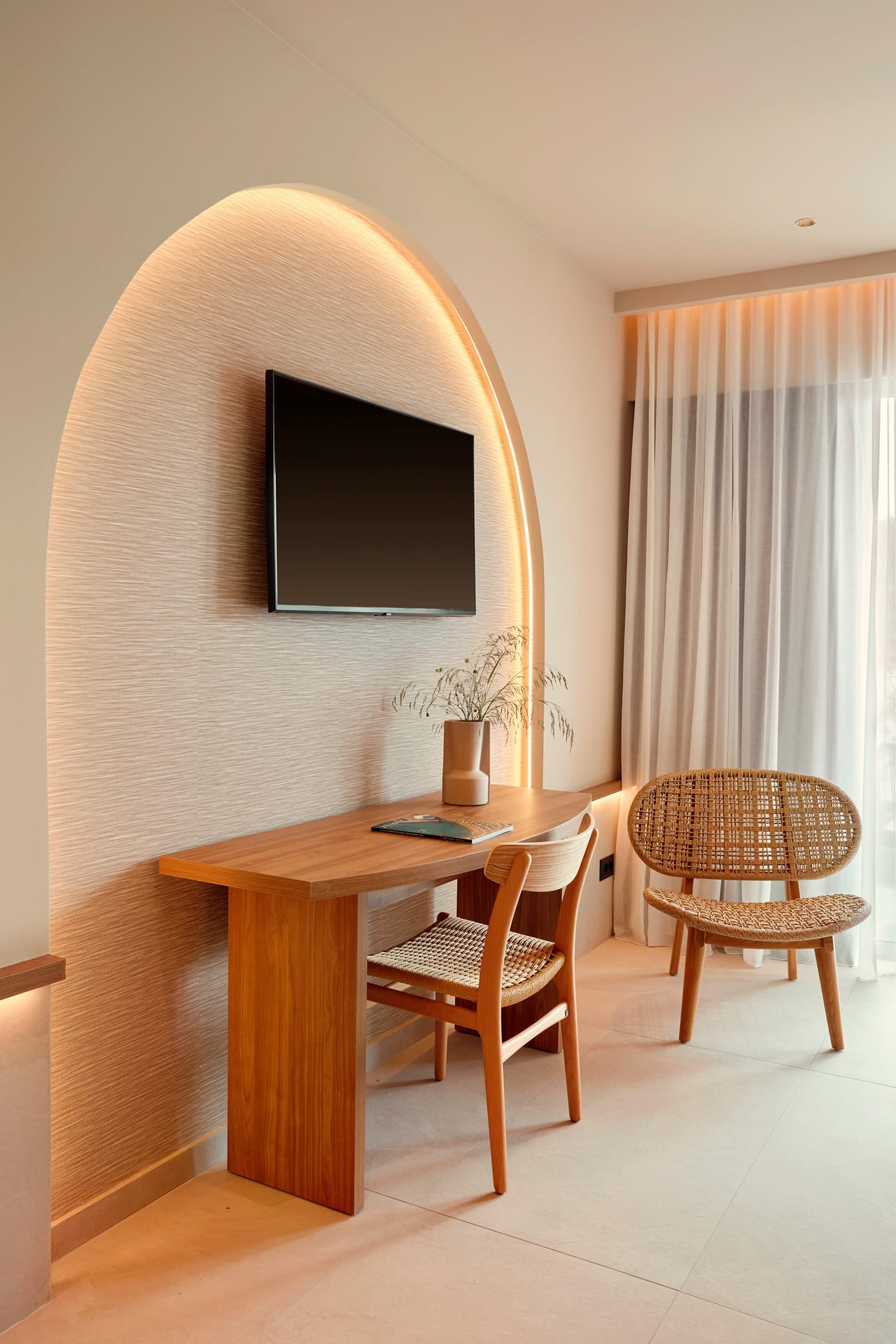 a table with chairs and a tv