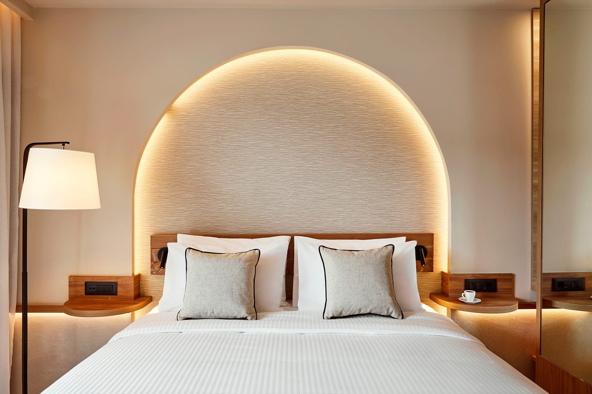 a bed with a white bed spread