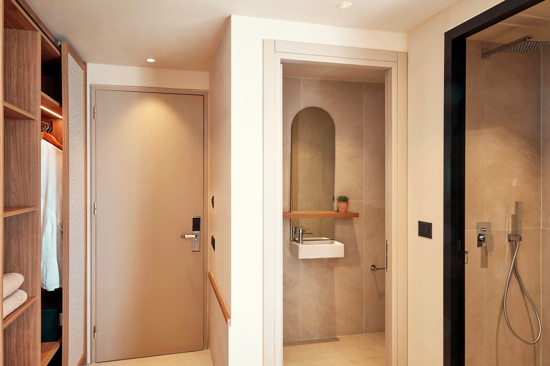 a bathroom with a shower and a sink