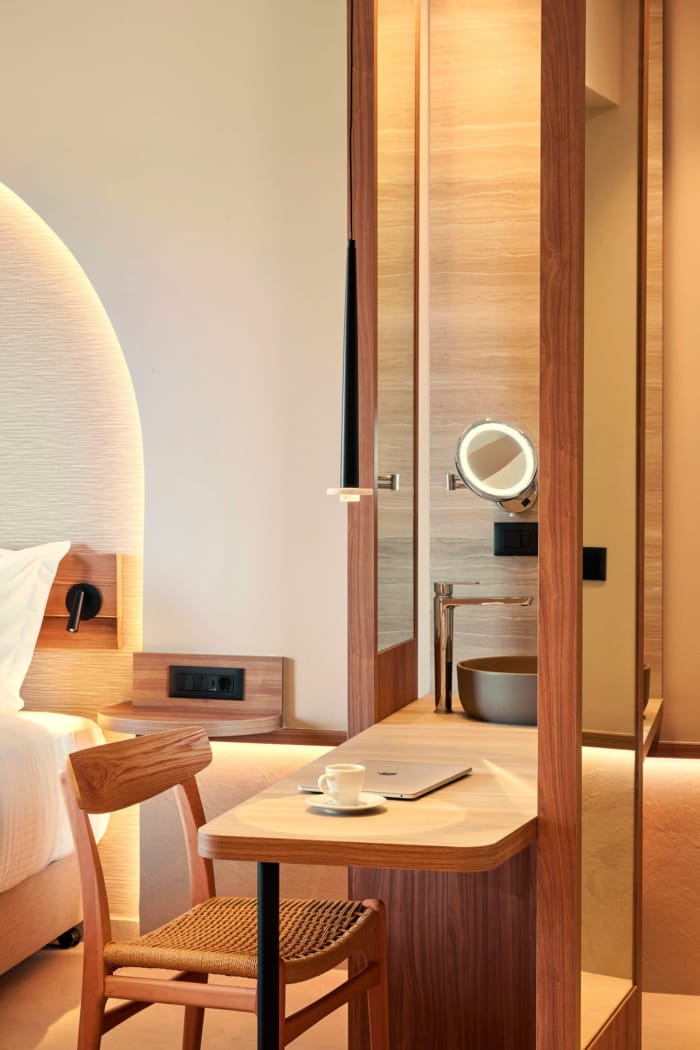 a room with a table and chairs