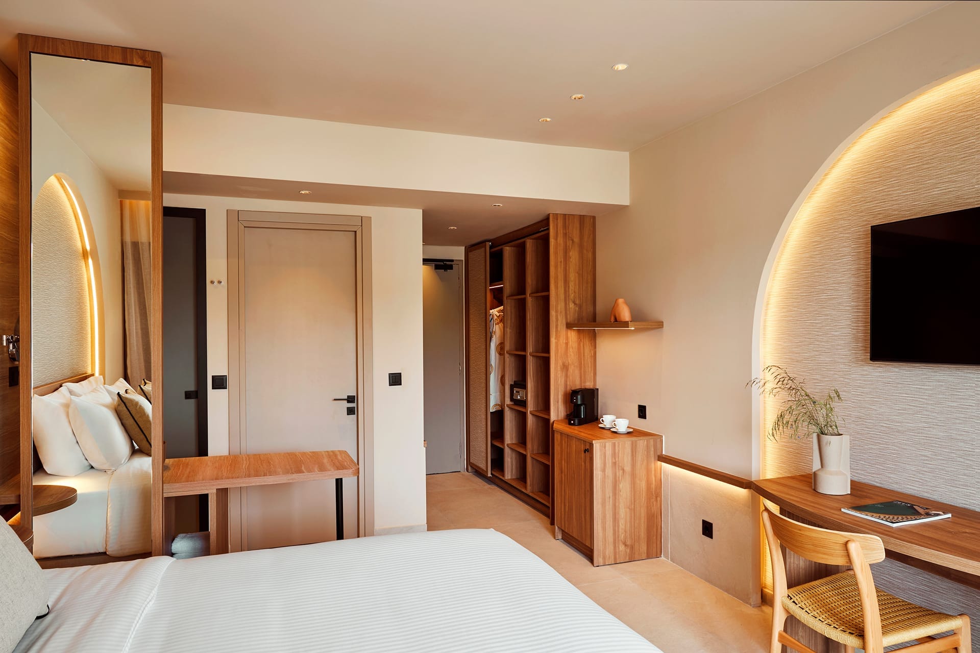 a room with a bed and a desk