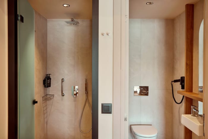 a bathroom with a shower unit