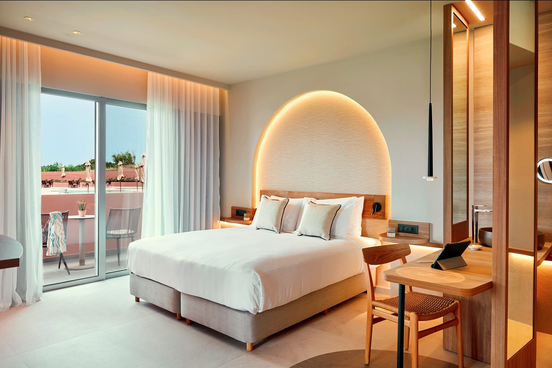 a hotel room with a large bed