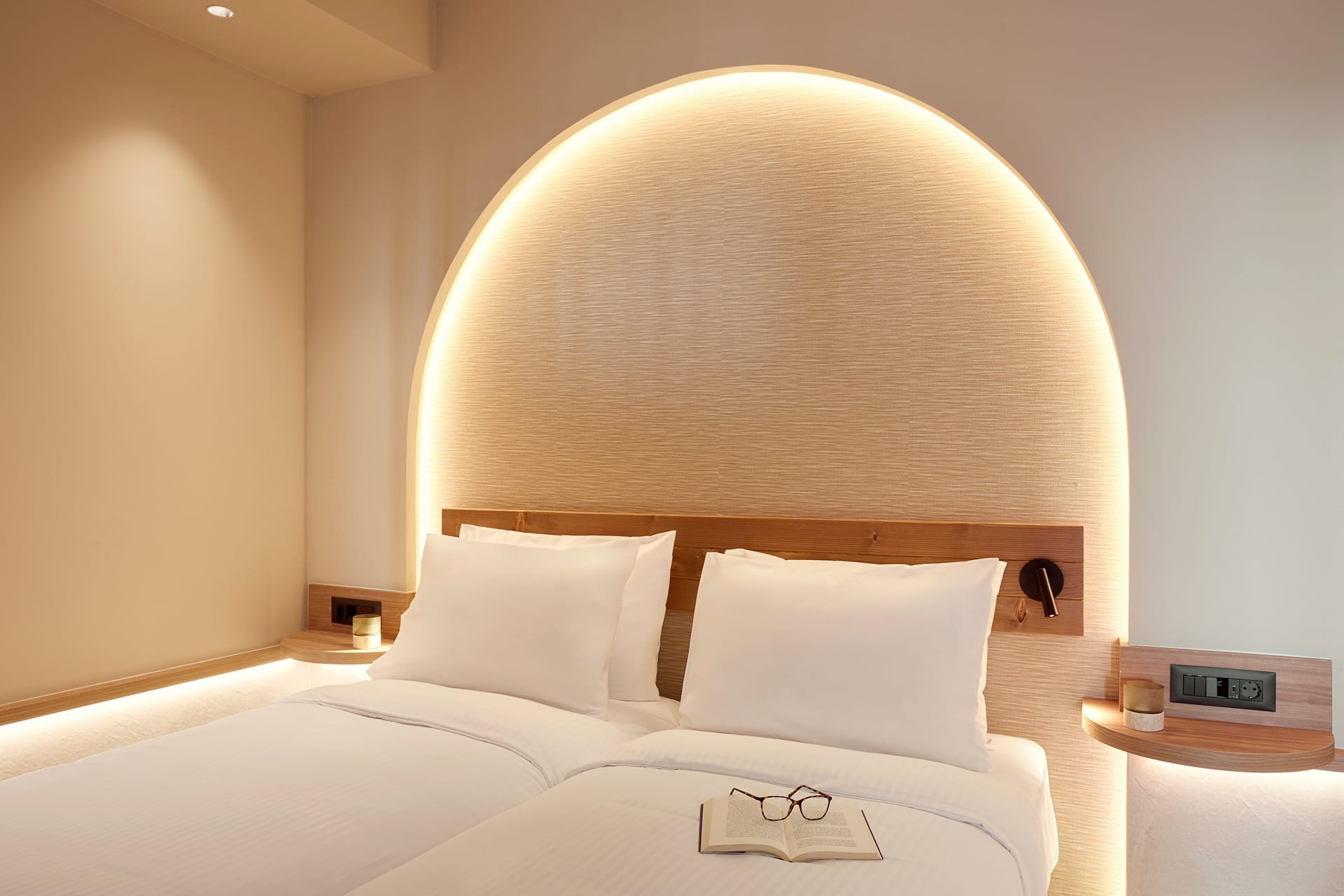 a hotel room with a large bed