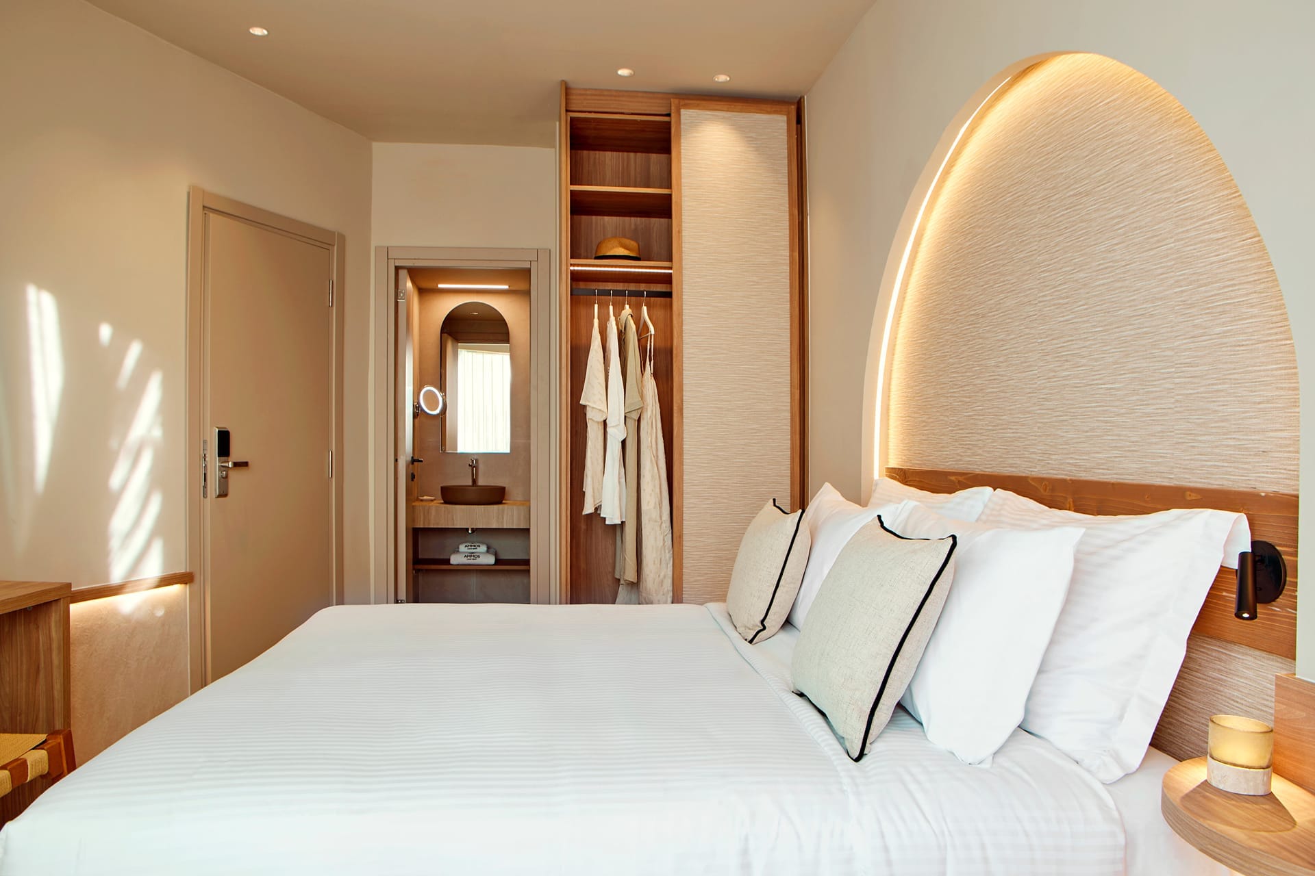 a bed with white pillows