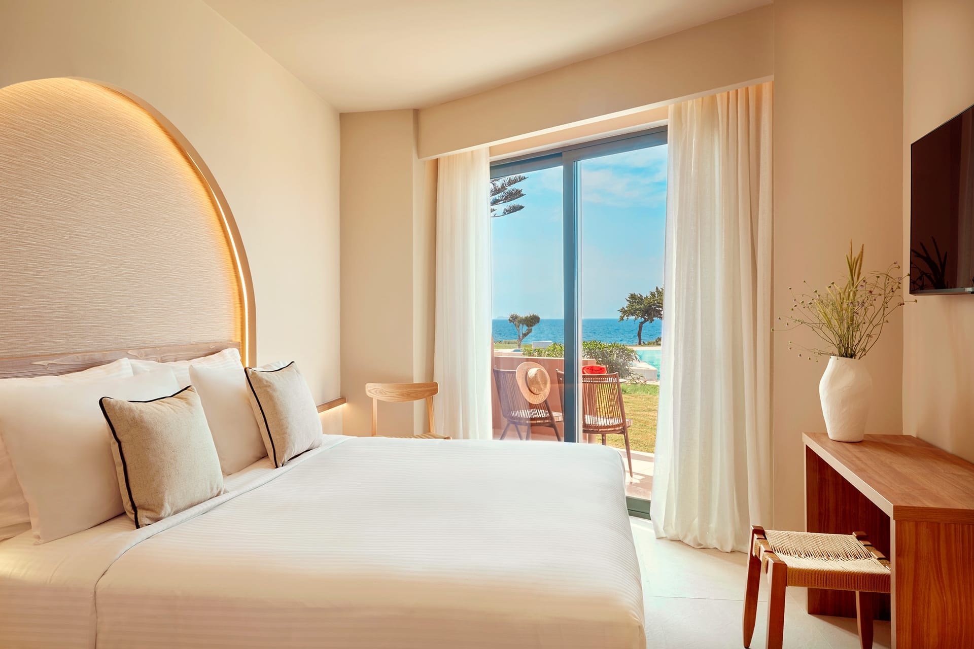 a bedroom with a large window