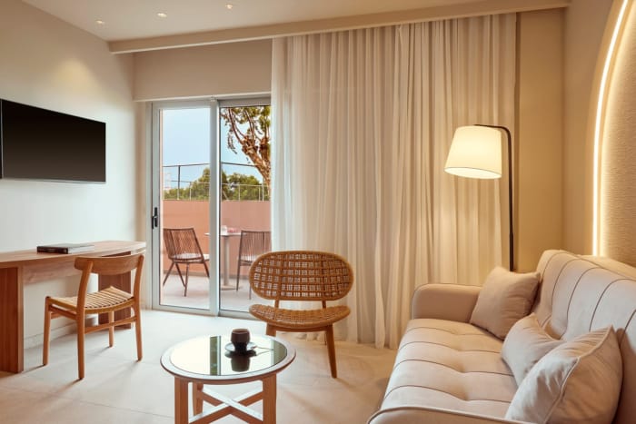 a living room with a large glass door