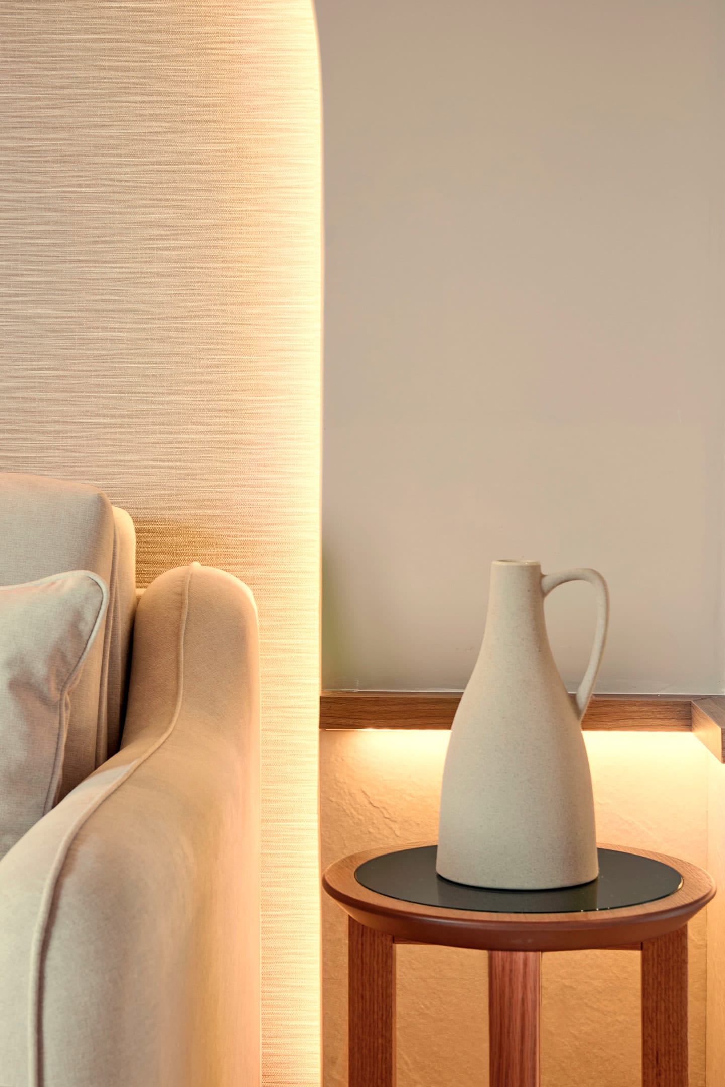 a white vase on a table