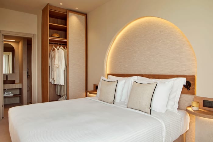 a bed with white pillows