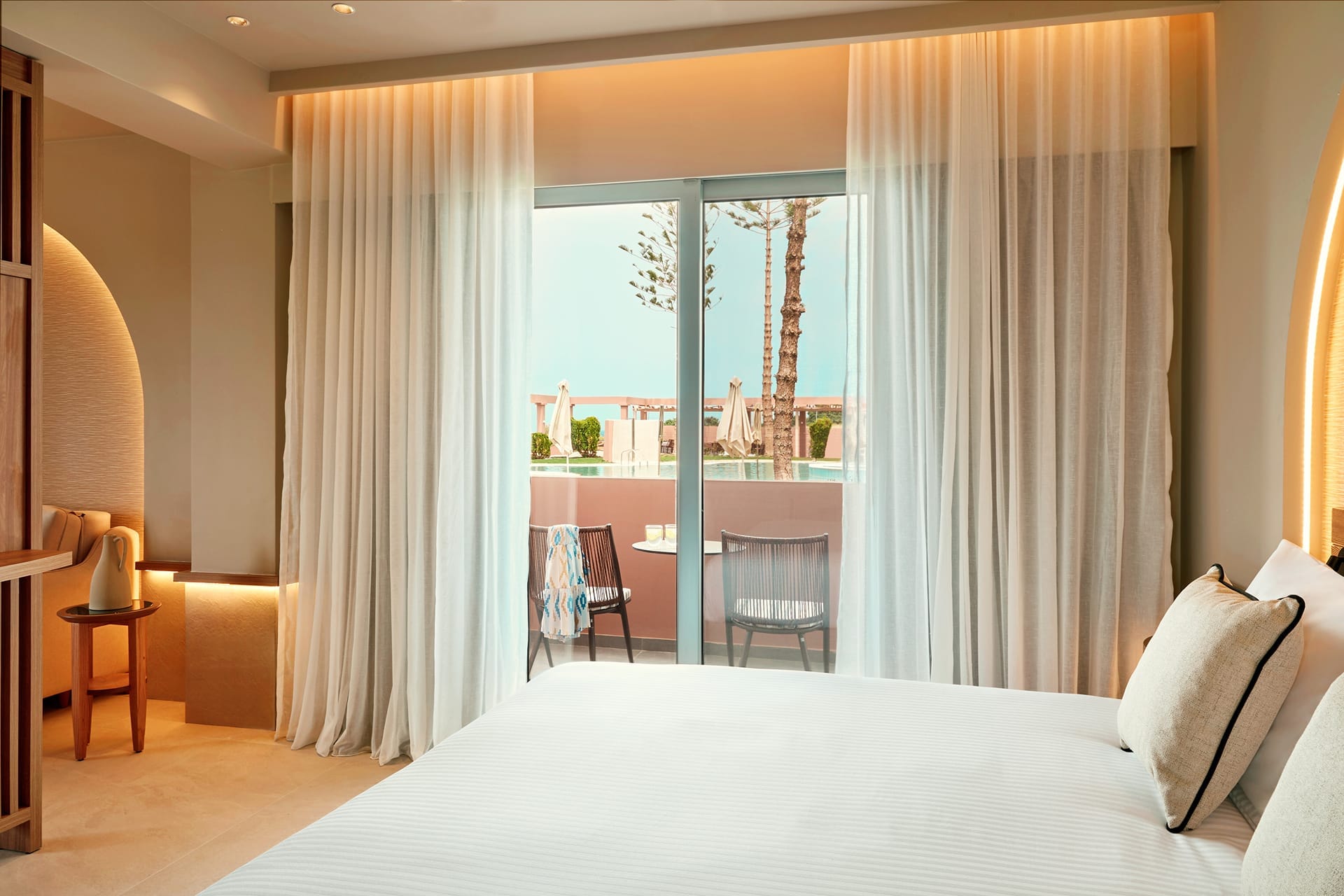 a bedroom with a large window