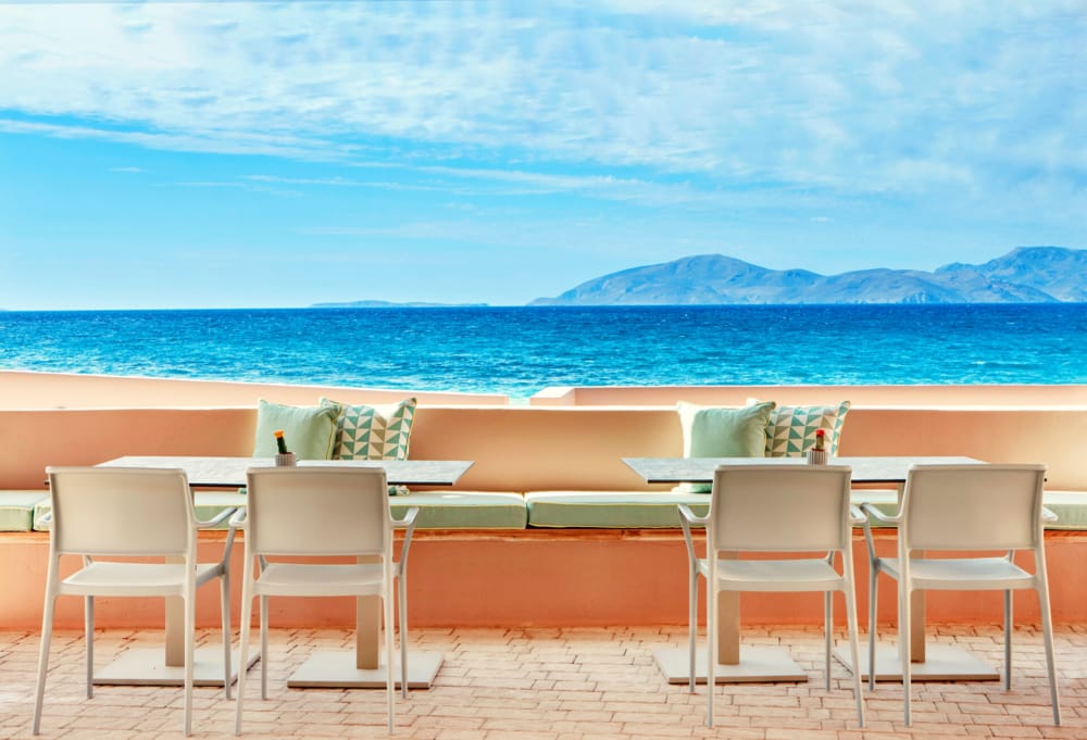 a table and chairs on a deck