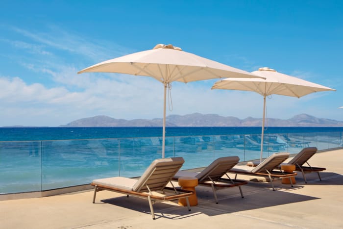 chairs and umbrellas on a beach
